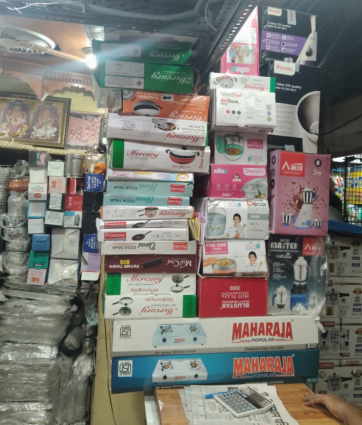 Stacked pressure cooker cartons ready for wholesale buyers